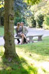 Bri and Ryan on a park bench.