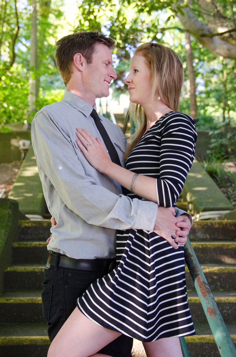Bri and Ryan close on the stairs